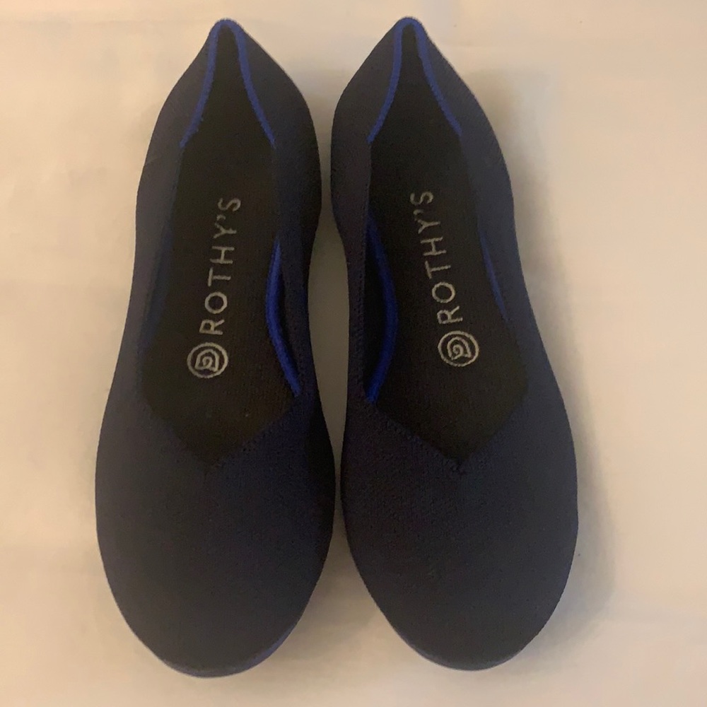 New  no box Rothy’s navy blue size W7.